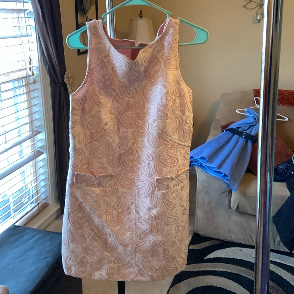 Pink and white dress with designs worn twice.
